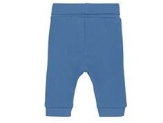 huttelihut bukser i blå med rib og elastik i benene, set bagfra