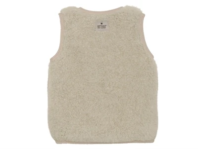 Huttelihut vest cement set bagfra med vamset overflade