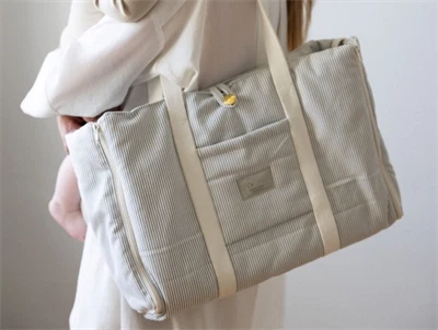 Cam Cam Copenhagen pusletaske Classic Stripes Blue i lyseblå nuance med fold-ud pusleunderlag