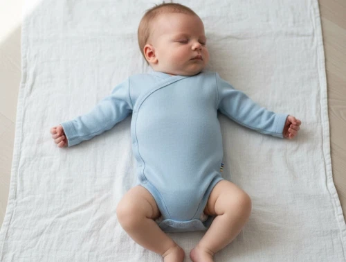 Joha uldbody i blå med wrap-around lukning