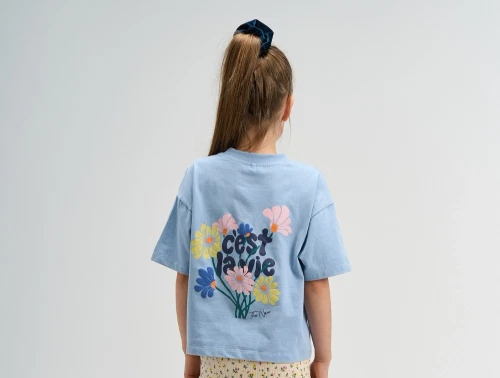 THE NEW t-shirt i lyseblå med blomsterprint bagpå