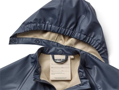 Wheat Mika regndragt ink detalje