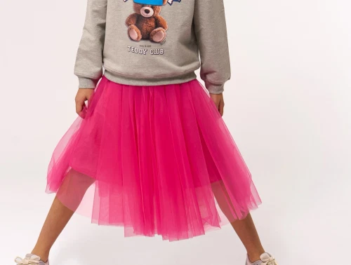 Pige iført pink tylskørt fra THE NEW
