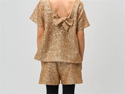 THE NEW paillet top gold med sløjfe i ryggen bagpå- set på barn bagfra