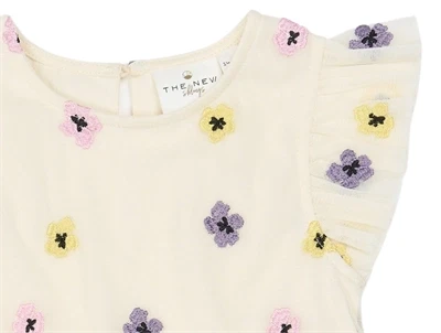 Nærbillede af THE NEW Siblings kjole gardenia med blomsterbroderi