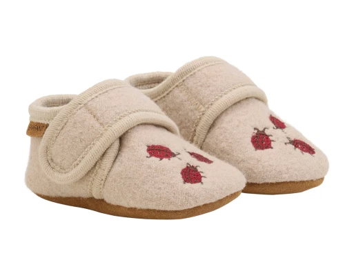 En Fant uldfutter sand med mariehønebroderi set forfra