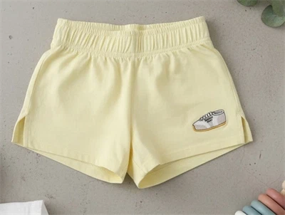 Mini Rodini yellow jogging shorts
