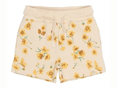 Petit Piao sweatshorts råhvid med gult blomsterprint forfra