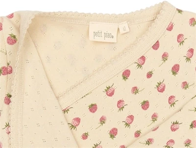 Petit Piao wrap bodystocking råhvid med jordbær mønster closeup