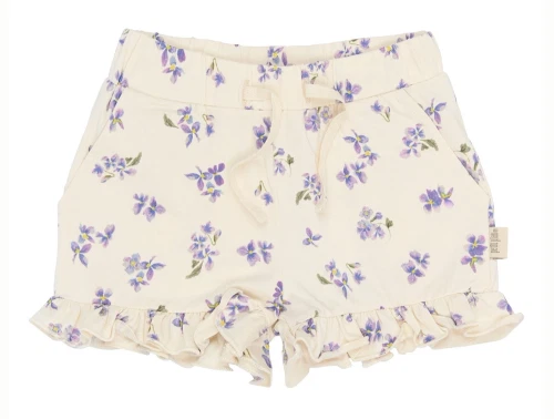 Petit Piao shorts i lys creme nuance med violprint og flæser forfra