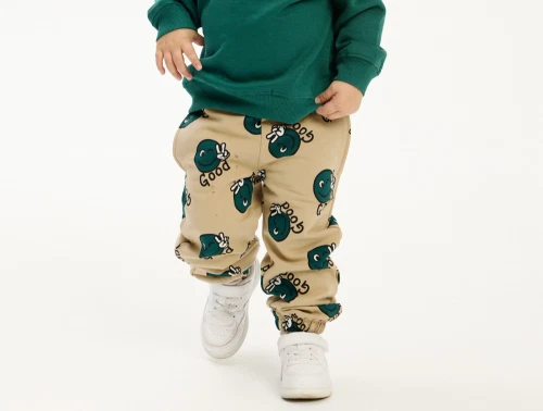 THE NEW siblings sweatpants humus med smiley print på barn