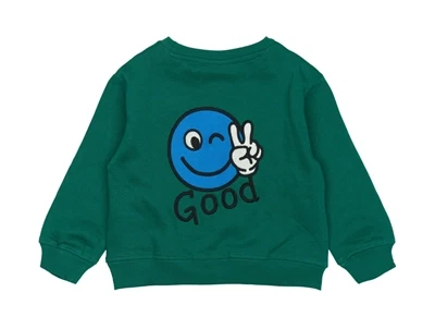 THE NEW Siblings sweatshirt grøn med blå smiley og teksten Good bagpå