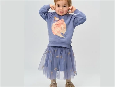 THE NEW siblings tylskørt i tempest aop med sløjfer iført barn