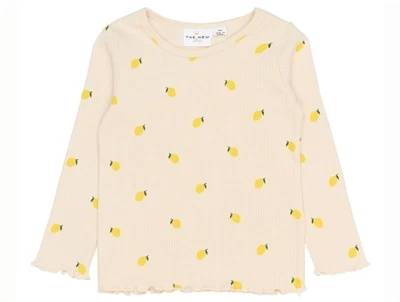 THE NEW Siblings Smilla rib bluse gardenia aop med citronprint forfra